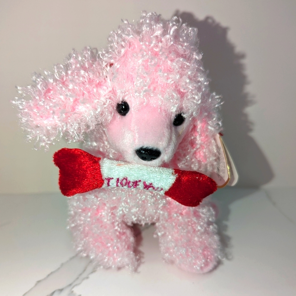 TY beanie baby. Pup in love. Soft pink. Excellent condition.